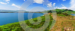 Beautiful view of Sevan lake with turquoise water and green hills, Sevan, Armenia