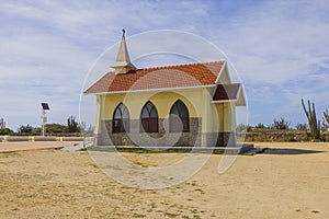 Beautiful view of small Catholic chapel known as `Pilgrims Church`. Aruba island.