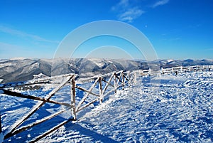 Beautiful view of the snow-covered mountain ridge in the winter