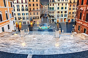 Beautiful view from the Spanish Steps on Piazza di Spagna, the Fontana della Barcaccia and Via dei Condotti in Rome photo