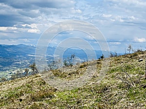 A beautiful view of the spring mountains and the sky in the Ukrainian Carpathians