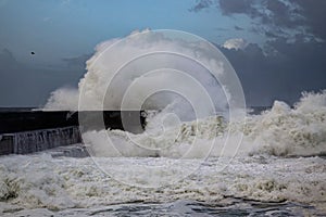 Beautiful view of stormy sea wave splash on a cloudy day