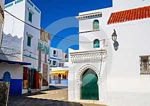 Beautiful view of street with typical arabic architecture in Asilah. Location: Asilah, North Morocco, Africa. Artistic picture.