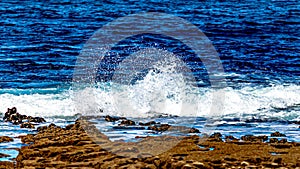 Beautiful view of surf in the waters of Doolin Bay