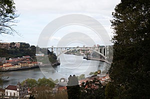 Beautiful view of Tagus river crossing Porto. Arrabida Bridge