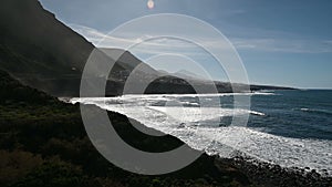 Beautiful view of the Teide volcano. Rocky beach of the Atlantic Ocean on the island of Tenerife