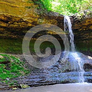 Beautiful view to famous Moldovan waterfall located near the village Saharna, Rezina region, Republic of Moldova