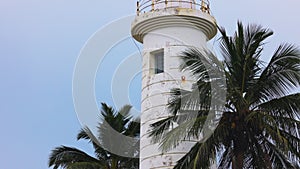 Beautiful view to the Galle fort in Sri Lanka. Lighthouse in fort Galle - Sri Lanka seascape. A walk through the old