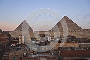 Beautiful View to the One of the Wonders of the Ancient World - Great Pyramids of Giza under Blue Sky and Day Lights of the Sun