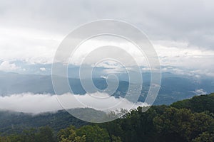 Beautiful view from the top of the mountain on the clouds crowning the country of Western Caucasus