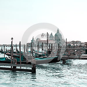 Beautiful view of traditional Gondola on Canal Grande with Basilica di Santa Maria della Salute in Venice, Italy
