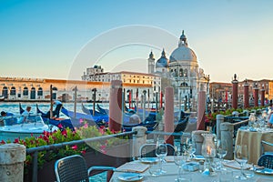 Beautiful view of traditional Gondolas on Canal Grande with hist