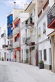 Beautiful view of the traditional street of Blanes, Spain. Street with traditional Spanish old architecture