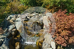 Beautiful view of Triple waterfall in Japanese garden. Public landscape park of Krasnodar