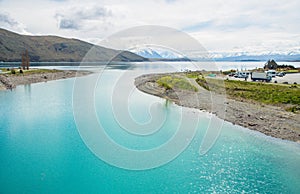 Beautiful view of turquoise water of lake Tekapo in New Zealand one of the most tourist attraction place in South island.