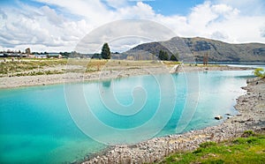 Beautiful view of turquoise water of lake Tekapo in New Zealand one of the most tourist attraction place in South island.