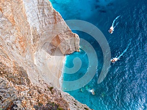 Beautiful view on two touristic boats going to Blue Caves reefs in Ionian Sea blue water. Sightseeing point. Two boats Greece Isla