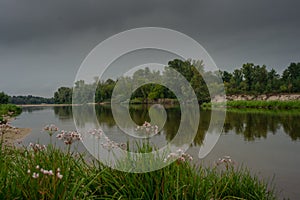 Beautiful view of Ukrainian Desna river, calm waters, dramatic skies