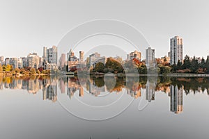 Beautiful view of Vancouver downtown reflecting on the water at sunset, BC, Canada