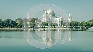 A beautiful view of Victoria Memorial with reflection on water, Kolkata, Calcutta, West Bengal, India photo