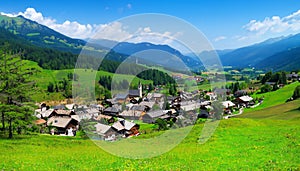 village in the middle of the valley. AI Generated