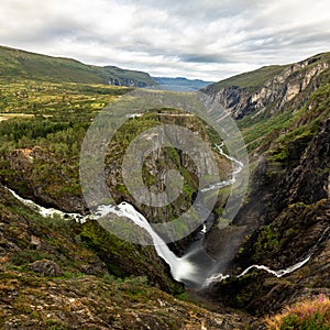 Beautiful view of the Voringsfossen waterfall. Picturesque mountain landscape with waterfalls.