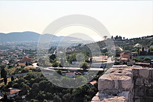 Beautiful view from the wall of the old fortress on the valley between the mountains in Montenegro.