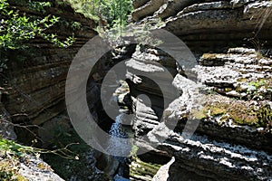 Beautiful view of water that flows slowly through an interesting canyon