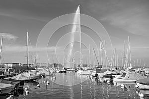 Beautiful view of the water jet fountain in the lake of Geneva