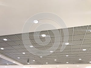 Beautiful view of White color emulsion painted gypsum ceiling and Macro grid ceiling combined as False ceiling interiors for an