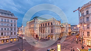 Beautiful view of Wiener Staatsoper aerial day to night timelapse in Vienna, Austria photo