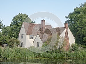 Beautiful view of Willy Lott`s House Cottage at flatford mill su