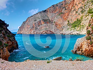 Beautiful view on Zakynthos Elation Sparto beach, stone rocks, blue water of Ionian Sea, reefs, Blue Caves. Love beach. Greece isl