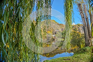 Beautiful views of the autumn river Berounka willow, forest and mountains,Czech.