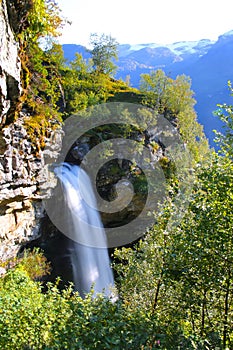 Beautiful views from FosserÃÂ¥sa hiking trail of StorsÃÂ¦terfossen waterfall Close to Geiranger fjord, Norway. photo