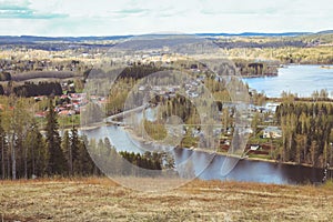 Beautiful views of the mountains to the lakes, houses, birches and forest. Finnish landscape. Lakes and valley. Karelia