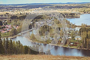 Beautiful views of the mountains to the lakes, houses, birches and forest. Finnish landscape. Lakes and valley. Karelia