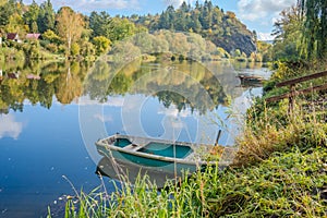 Beautiful views of the river Berounka a Wooden boats in the autumn season