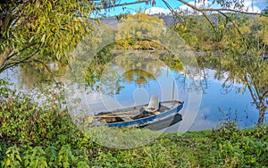 Beautiful views of the river Berounka a Wooden boats in the autumn season