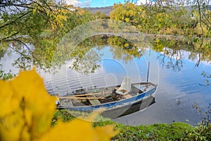 Beautiful views of the river Berounka a Wooden boats in the autumn season