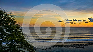 Beautiful views of the sky at sunset on the beach from the cliff