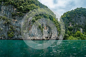 Beautiful views of the steep rock cliffs on the sea