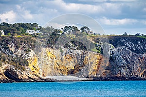 Beautiful village of Morgat with the sand beach and rocky coastline, Finistere, Brittany (Bretagne), France.