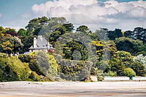 Beautiful village of Morgat with the sand beach and rocky coastline, Finistere, Brittany (Bretagne), France.