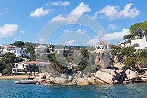 Beautiful village of Port Rafael from the sea, Sardinia, Italy.