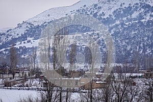 Beautiful village in the West Tianshan Mountains in winter