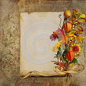 Beautiful vintage background with card for text and bouquet of autumn flowers