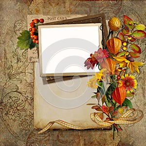 Beautiful vintage background with frame, card for text and bouquet of autumn flowers