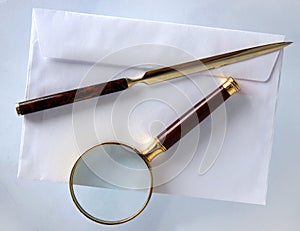 Magnifying glass and a letter opener