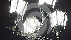 Beautiful, vintage, lighted street lamps, isolated on night sky background. Close up for black old fashioned lanterns at